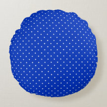 Petits pois blancs sur un oreiller rond bleu cobal