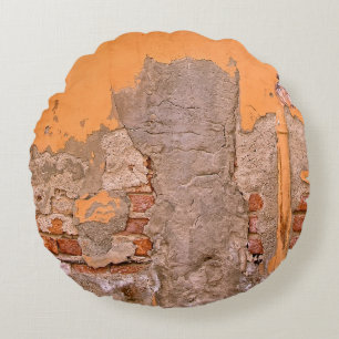 COUSSINS RONDS PHOTO D'ORANGE ET PEINTURE DE MUR GRIS