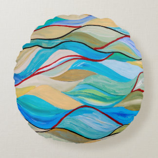 Coussins Ronds Un tableau abstrait avec des formes ondulées en pâ