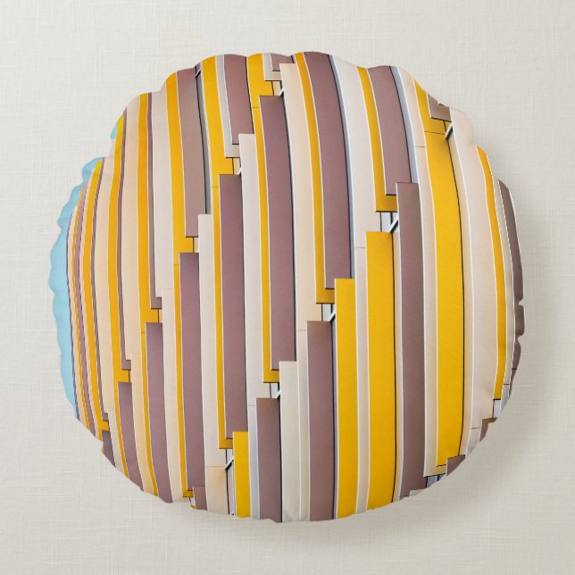 COUSSINS RONDS YELLOW CONCRETE BUILDING DURING DAYTIME (Devant)