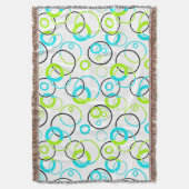 Couverture anneaux et cercles bleus, verts et noirs sur fond (devant Vertical)