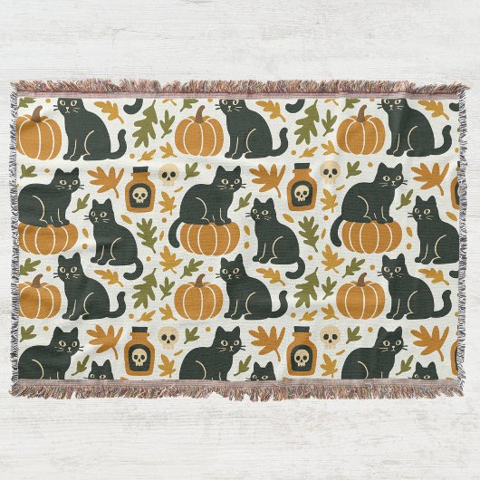 Couverture Chat noir et citrouille tissés