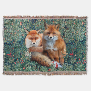 COUVERTURE FOXES ROUGES PARMI LA VERDURE, LE FOLIAGE ET LES F