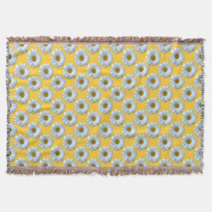 Couverture jaune couvrante de jet de marguerites