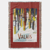 Couverture La terre du soleil - skis se tenant dans la neige (devant Vertical)