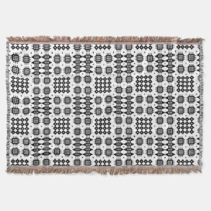 Couverture noire et blanche de motif de tapisserie