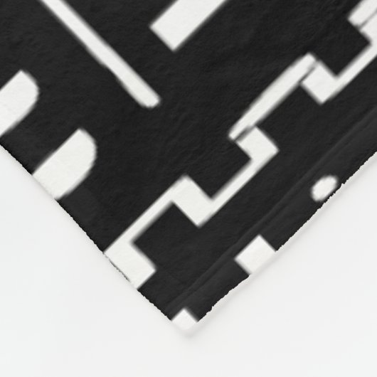 Couverture noire et blanche d'ouatine de Mudcloth, (Coin)