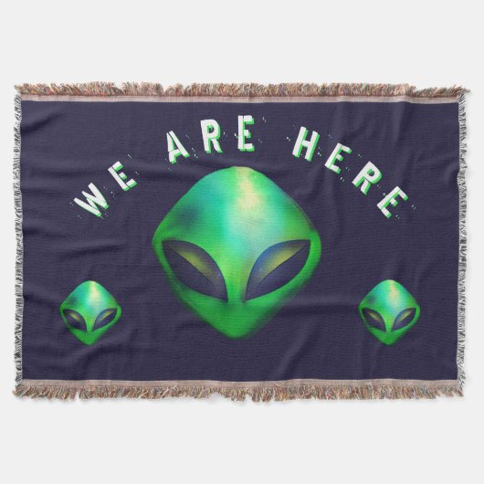 Couverture "Nous sommes ici" Tête d'alien vert (Devant)