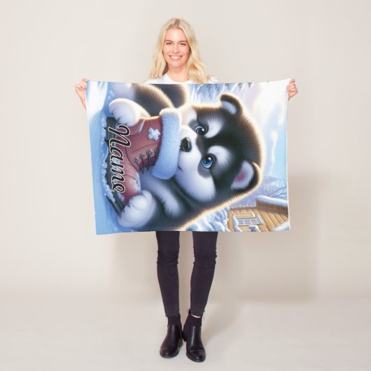 Couverture Polaire Chiot jouant avec une botte hivernale couverte de (En situation)