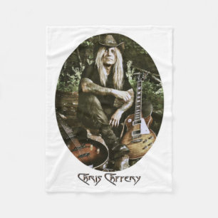 Couverture Polaire Chris Caffery assis avec des guitares (ovale)
