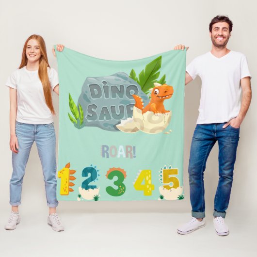 Couverture Polaire Cosy Hatching Dinosaur Fleece Blanket (En situation)