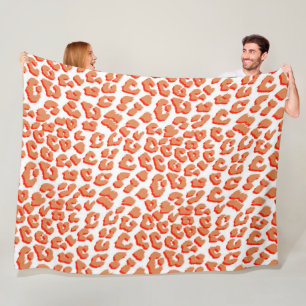 Couverture Polaire Couleur orange et Empreinte de léopard blanc