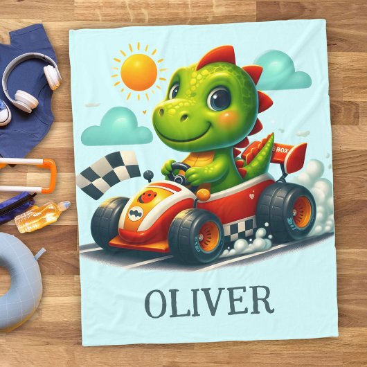 Couverture Polaire Dinosaure vert mignon dans une voiture de course
