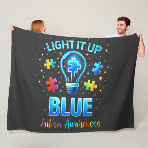 Couverture Polaire Éclairer en bleu pour la sensibilisation à l'autis