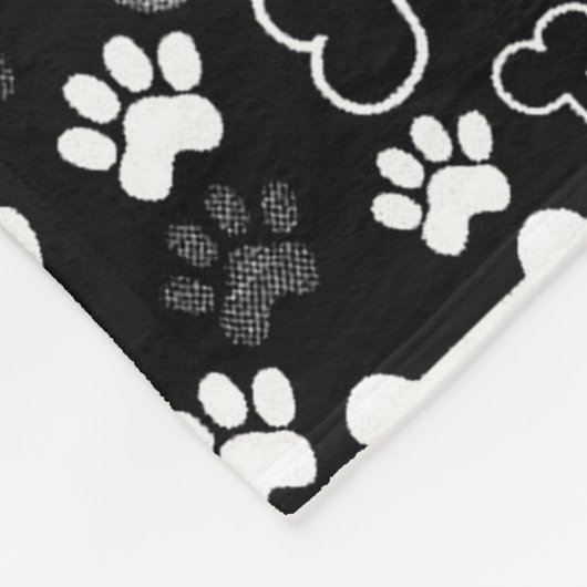 Couverture Polaire Empreintes de pattes et os noirs et blancs (Coin)