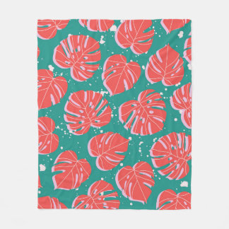 Couverture Polaire Feuilles de monstère rouge sur motif vert transpar