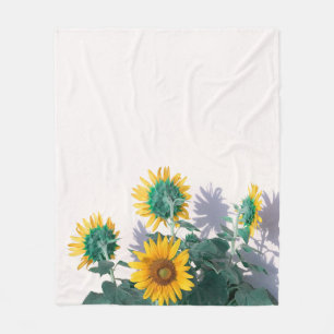 Couverture Polaire Fleurs bleues et jaunes sur le mur blanc