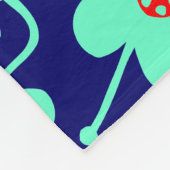 Couverture Polaire Fleurs concurrentes - Turquoise et rouge sur Deep  (Coin)