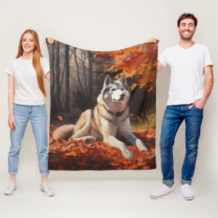 Couverture Polaire Husky Sibérien dans les feuilles d'automne qui tom