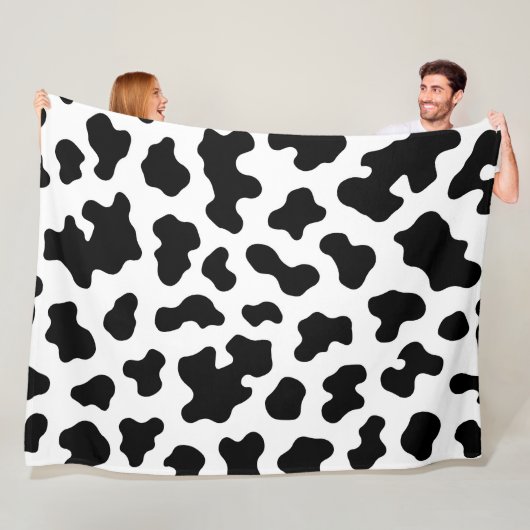 Couverture Polaire Impression cuir de vache noir et blanc (En situation)