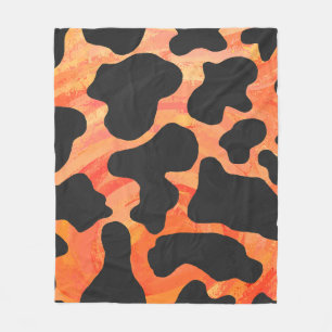 Couverture Polaire Impression noire et orange de vache
