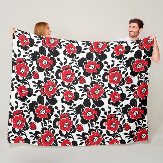 Couverture Polaire Joli motif floral en rouge, noir et blanc (En situation)
