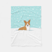 Joyeux Pembroke Welsh Corgi dans la neige d'hiver