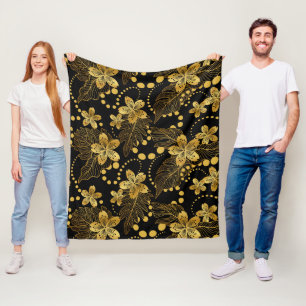 Couverture Polaire L'or sur les fleurs et les feuilles tropicaux noir