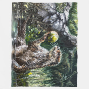 Couverture Polaire Loutre avec balle de tennis