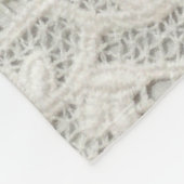 Couverture Polaire Magnifique, subtile, textile laqué blanc gros plan (Coin)