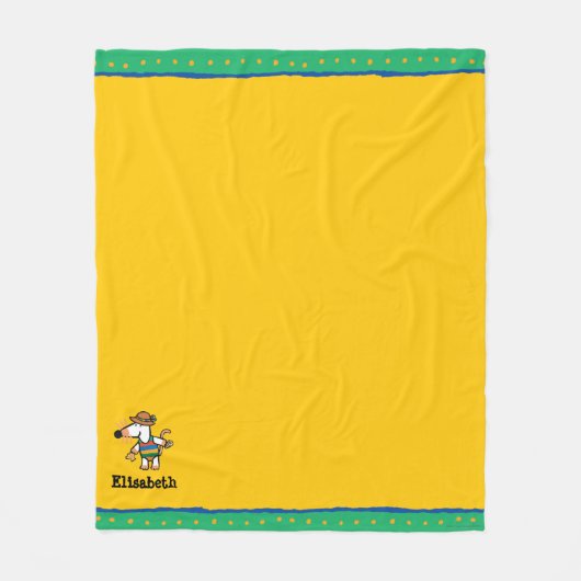 Couverture Polaire Maisy rassemblant des coquilles à la plage (Devant)