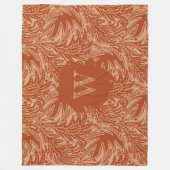 Couverture Polaire Monogramme vert parmi les feuilles (Devant)