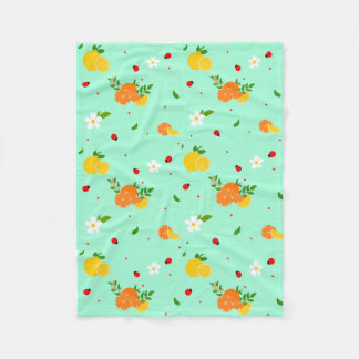 Couverture Polaire Motif botanique de citrus et coccinelle avec des f
