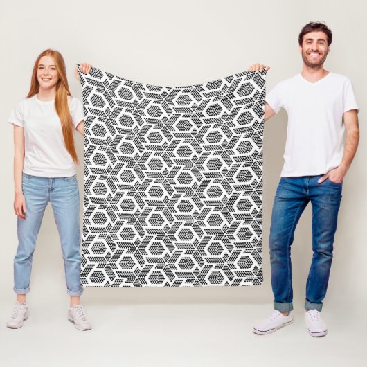 Couverture Polaire Motif géométrique à points blancs en noir (En situation)