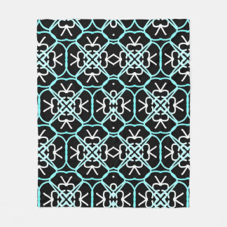 Couverture Polaire Motif géométrique En Bleu Aqua, Blanc Et Noir.