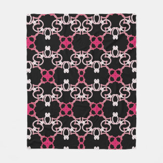 Couverture Polaire Motif géométrique En Rose, Blanc Et Violet.