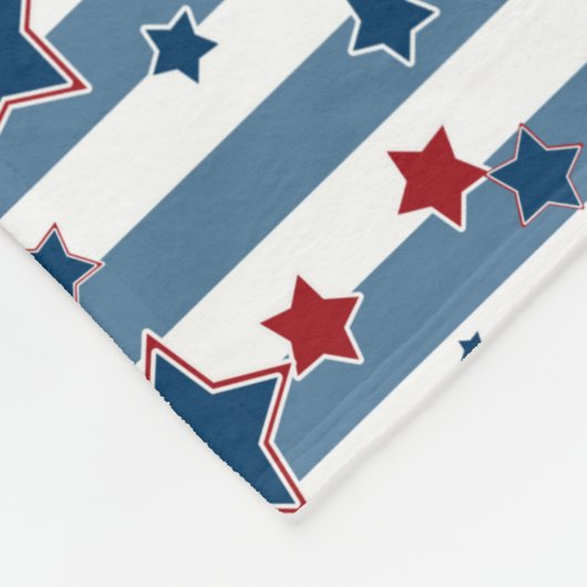 Couverture Polaire Motif rayé étoile dans les tons rouge et bleu lanc (Coin)