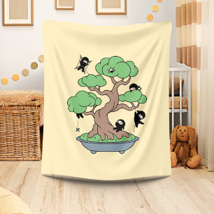 Couverture Polaire Ninjas minuscules en bonsaï sur jaune