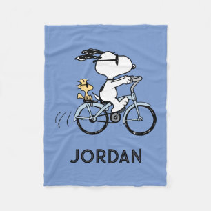 Couverture Polaire Peanuts Snoopy & Woodstock à bicyclette