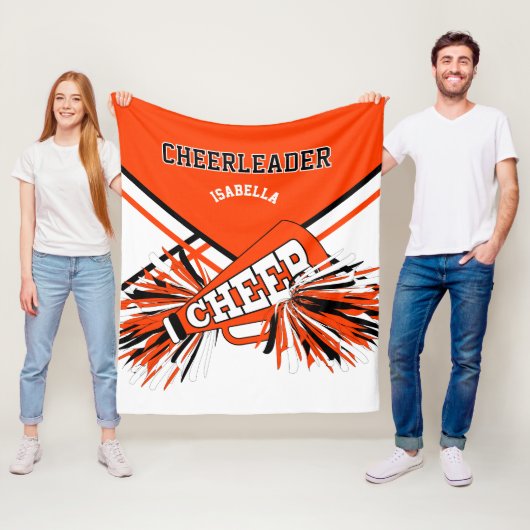 Couverture Polaire Pom-pom girl 📣 orange, noir et blanc (En situation)
