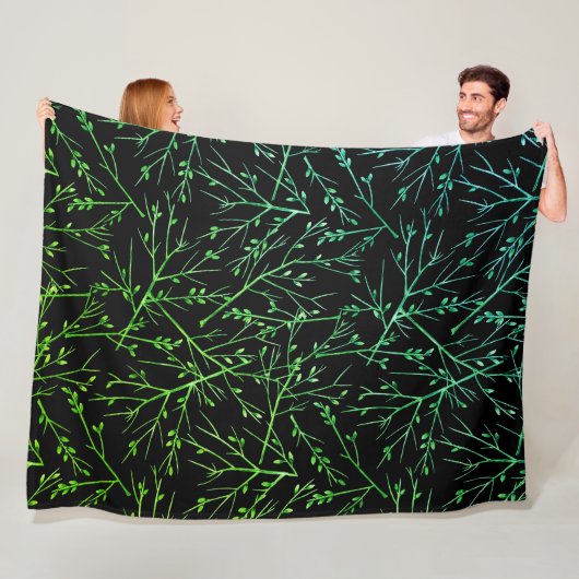 Couverture Polaire Rameaux verts sur fond noir (En situation)