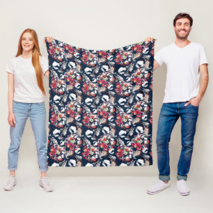 Couverture Polaire Rouge, fleurs blanches sur bleu.