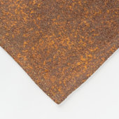 Couverture Polaire Rouille noire, texture métallique gros plan. (Coin)