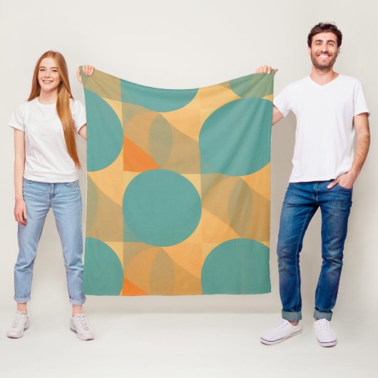 Couverture Polaire Sarcelle, Brun Clair et Orange dans un Motif Rétro (En situation)