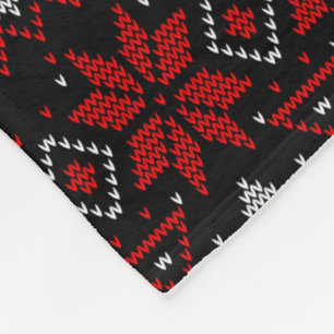 Couverture Polaire Scandinave, tricotant