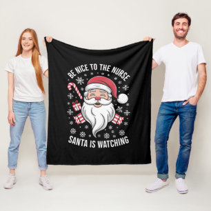 Couverture Polaire Soyez gentil avec l'infirmière Santa regarde Noël