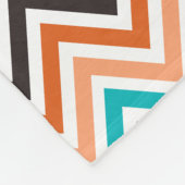 Couverture Polaire Turquoise avec motif chevron aux tons orange (Coin)