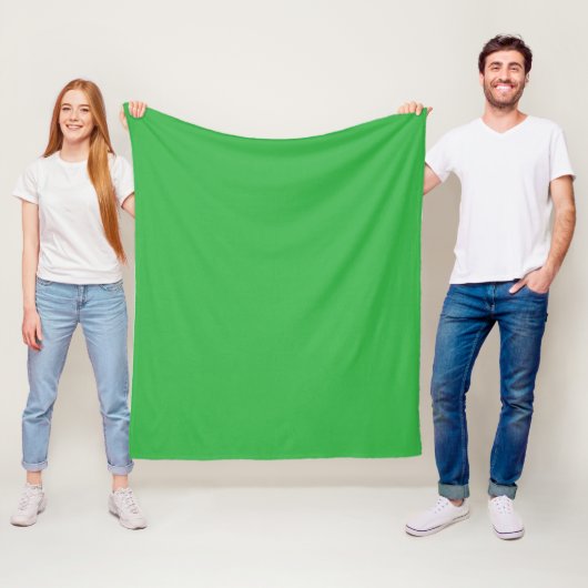 Couverture Polaire un arrière - plan vert avec une bordure blanche (En situation)