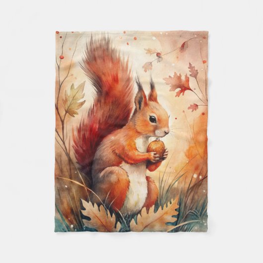 Couverture Polaire Un écureuil rouge qui mange une noisette (Devant)