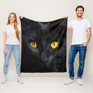 Couverture Polaire Visage de chat noir avec yeux jaunes brillants